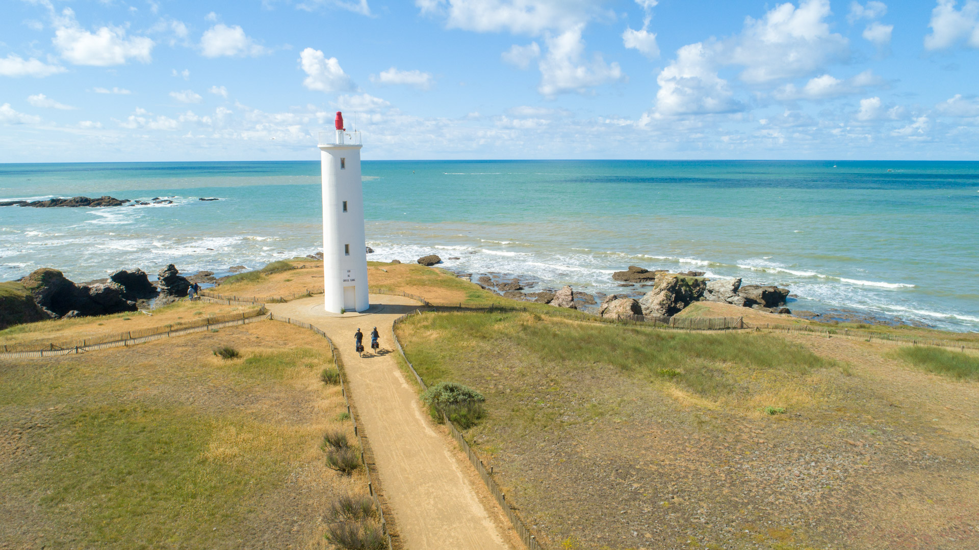 2 vélos rejoignent le phare de feu de Grosse Terre